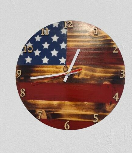 12" wooden wall clock decorated with stars and stripes and laser cut out numbers