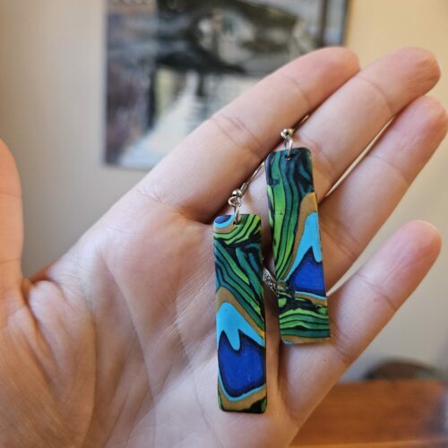 Rectangle shaped earrings with peacock feather design