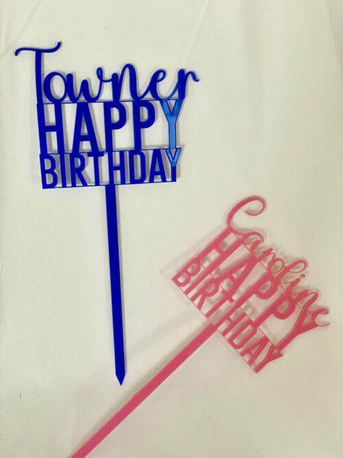 pink and blue acrylic cake toppers