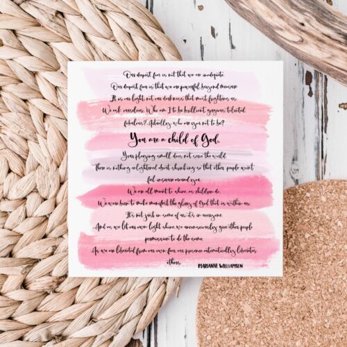 Pink watercolor brushstroke background with the Marianne Williamson poem “Our Deepest Fear” hand lettered