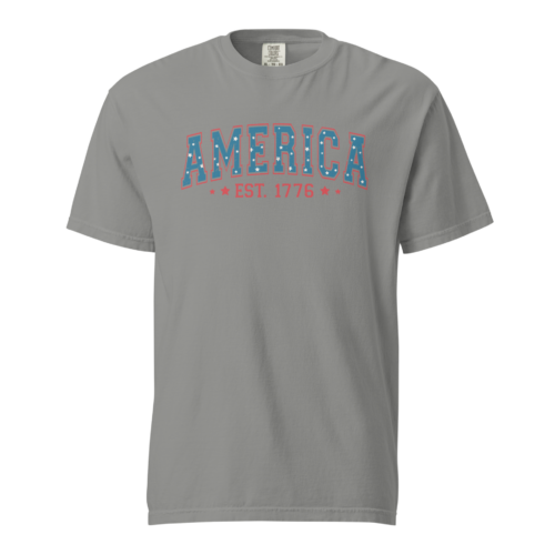 Comfort Colors C1717 t-shirt in grey with “America, Est. 1776” in a muted, red, white, and blue distressed color scheme