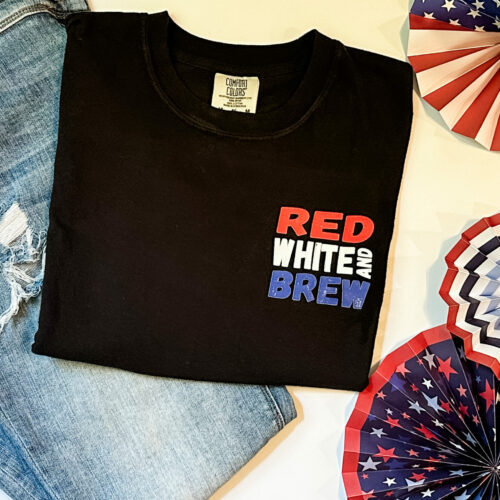 Comfort Colors C1717 unisex adult t-shirt in black with the saying “Red, White, and Brew” on the front. Not pictured, back features a distressed American flag and a beer tap pouring into a class