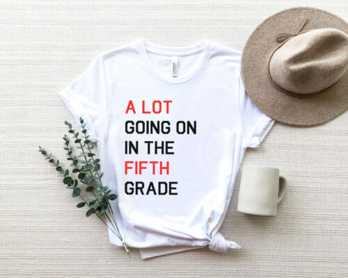 Bella Canvas 3001 unisex adult white T-shirt with saying, “A lot going on in the Fifth Grade.” Show off your Swiftie Love